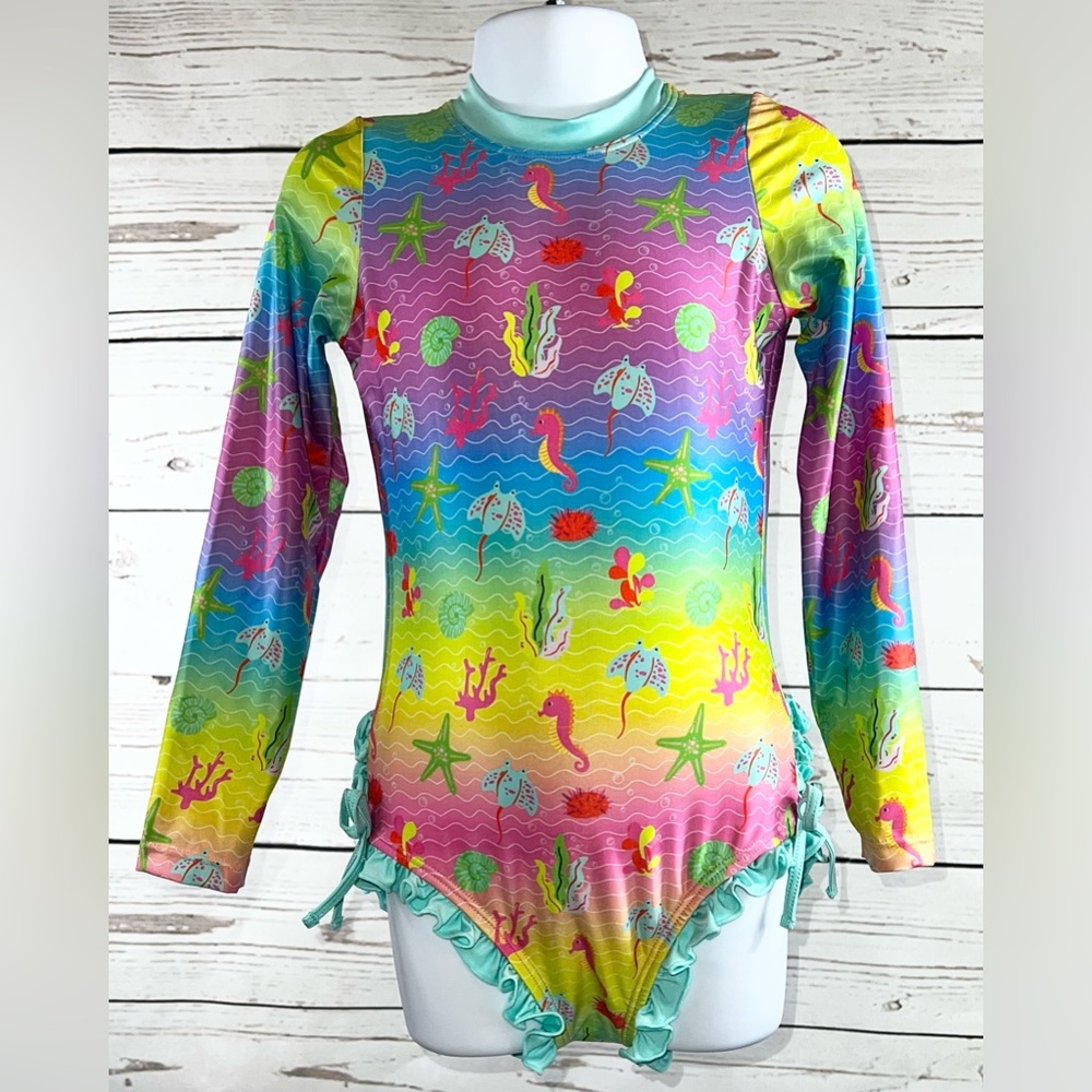 Lil Cactus,Girl’s size 6T, blue&pink rainbow sea creatures long-sleeve swimsuit.